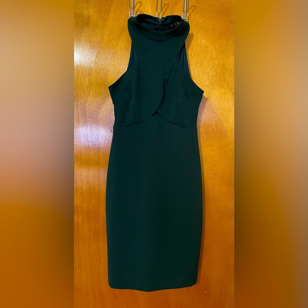 Short emerald dress with high neckline
